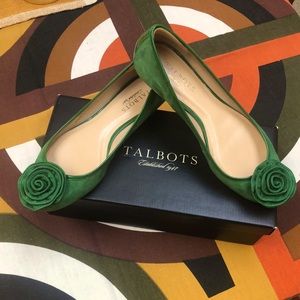 Talbot’s green suede ballet flats with rosette